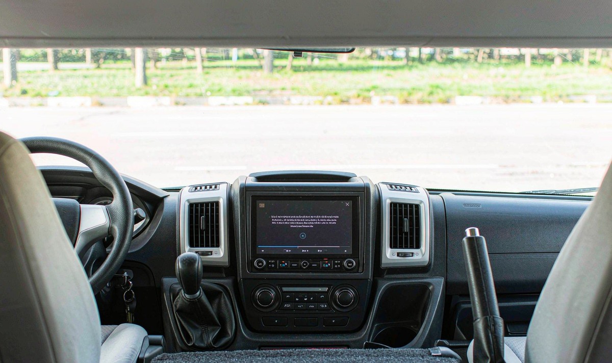 Parked car with a parking brake warning message on the Android car stereo screen while a video file is requested