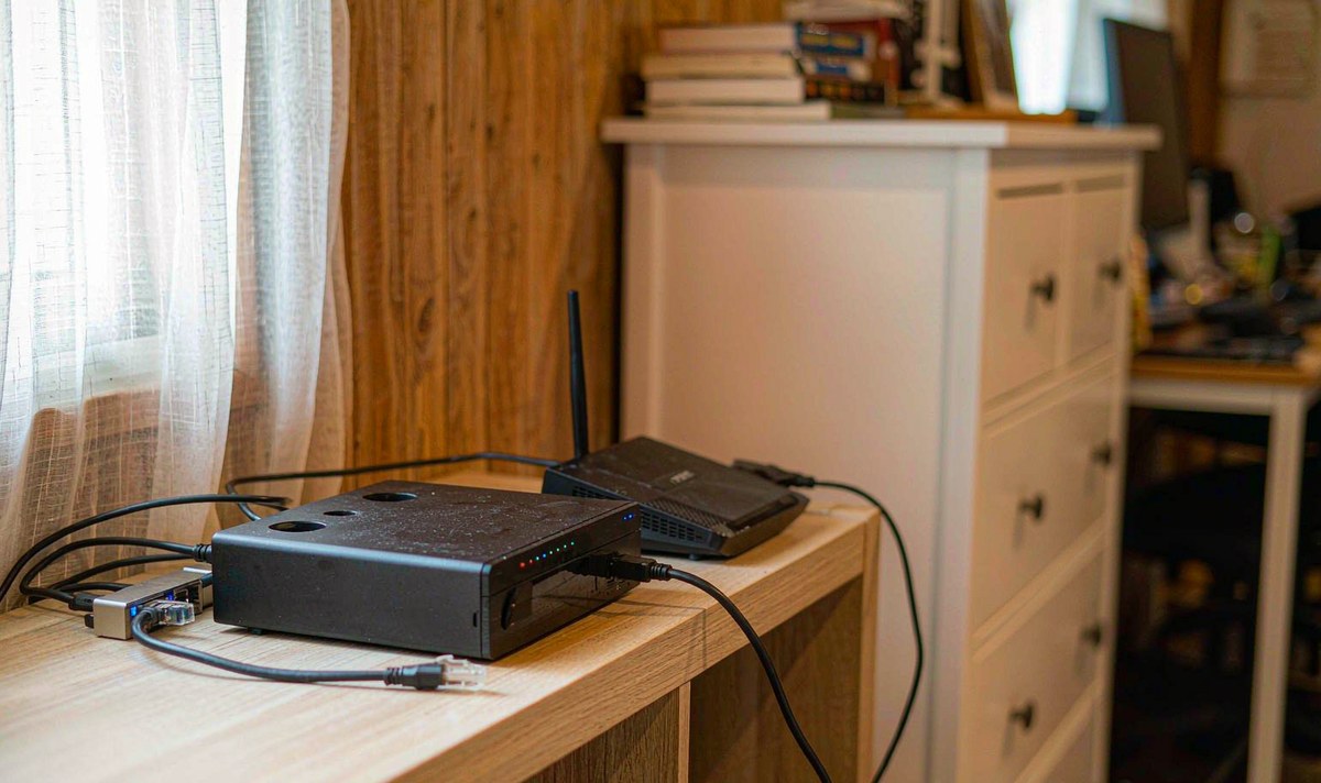 The NAS answers only to addresses on the home network it sits on Home NAS unit and a Wi-Fi router sharing a shelf in a home office, the source a car head unit has to reach